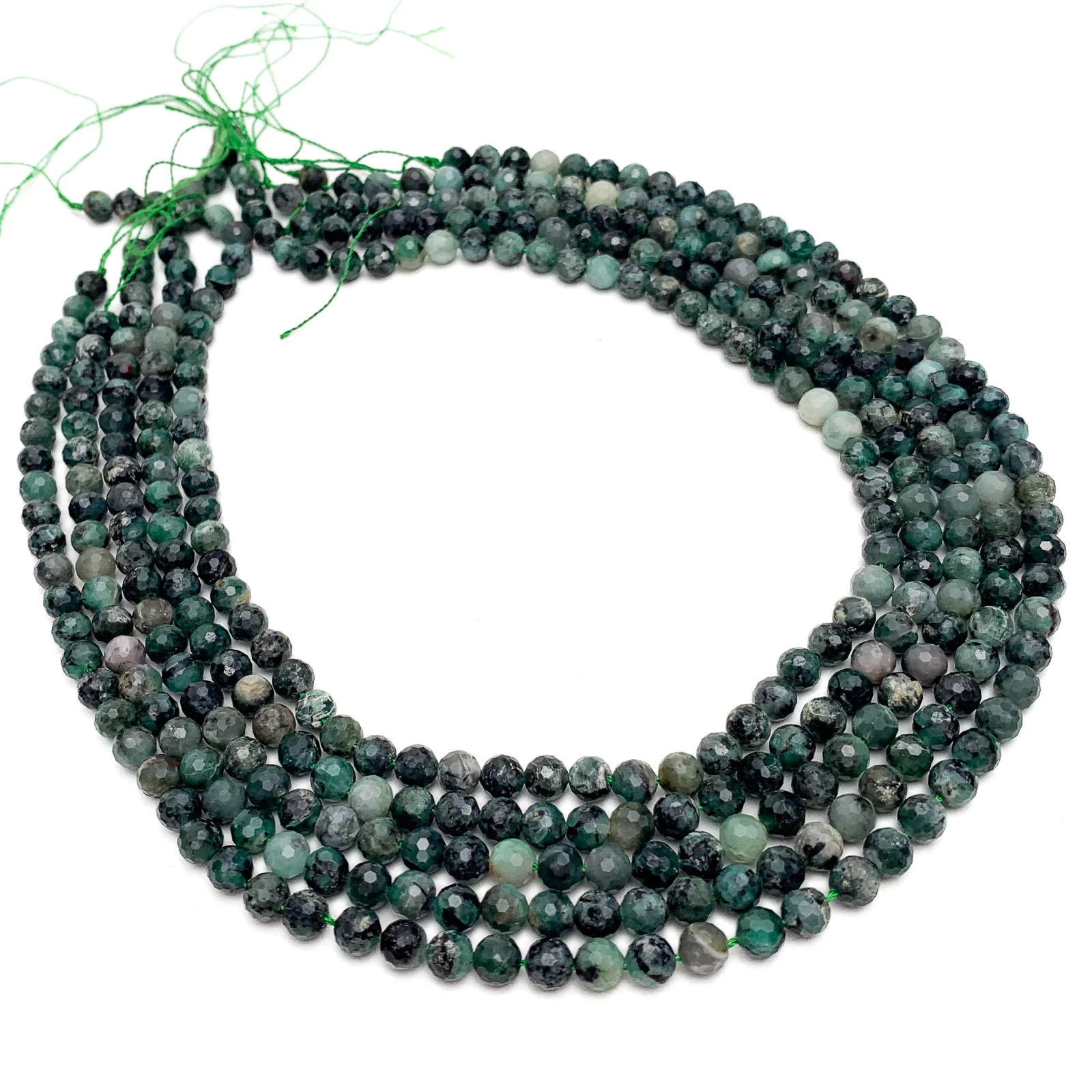 Emerald 6mm Faceted Rounds - Image 3