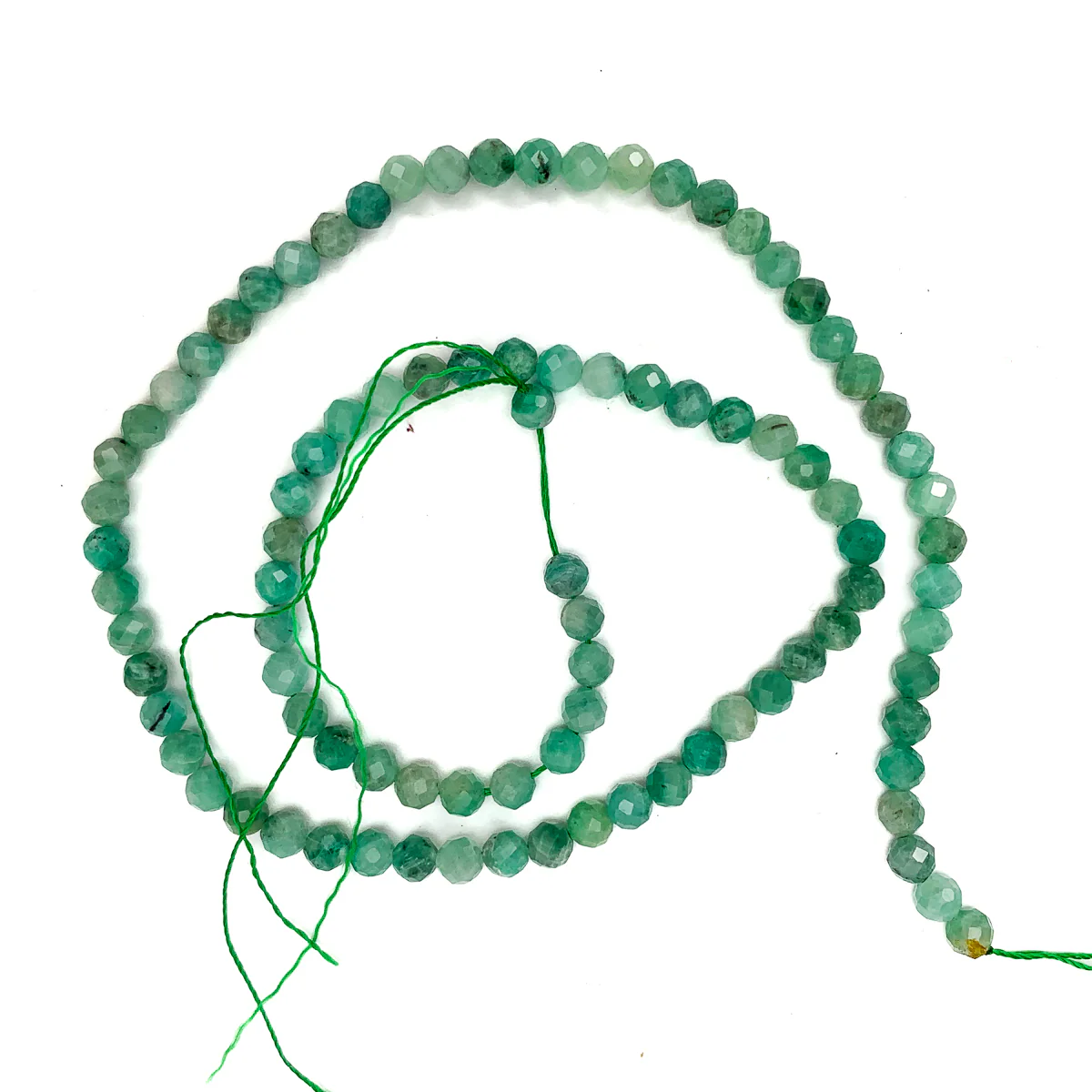 Emerald Columbia 4mm Faceted Rounds - Image 2