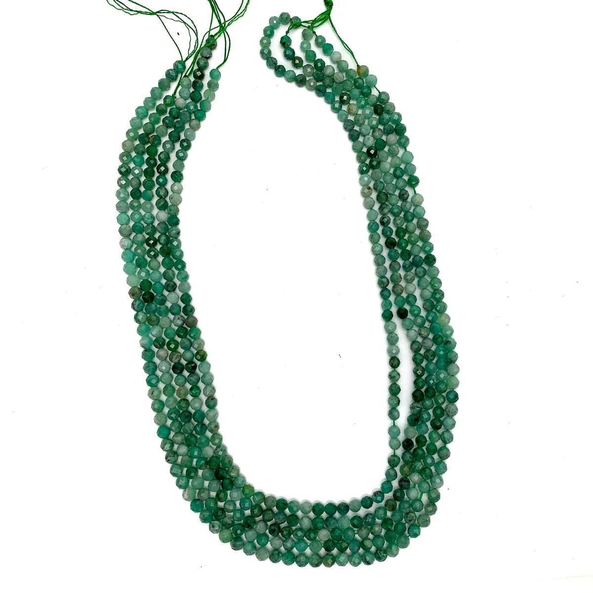 Emerald Columbia 4mm Faceted Rounds - Image 3