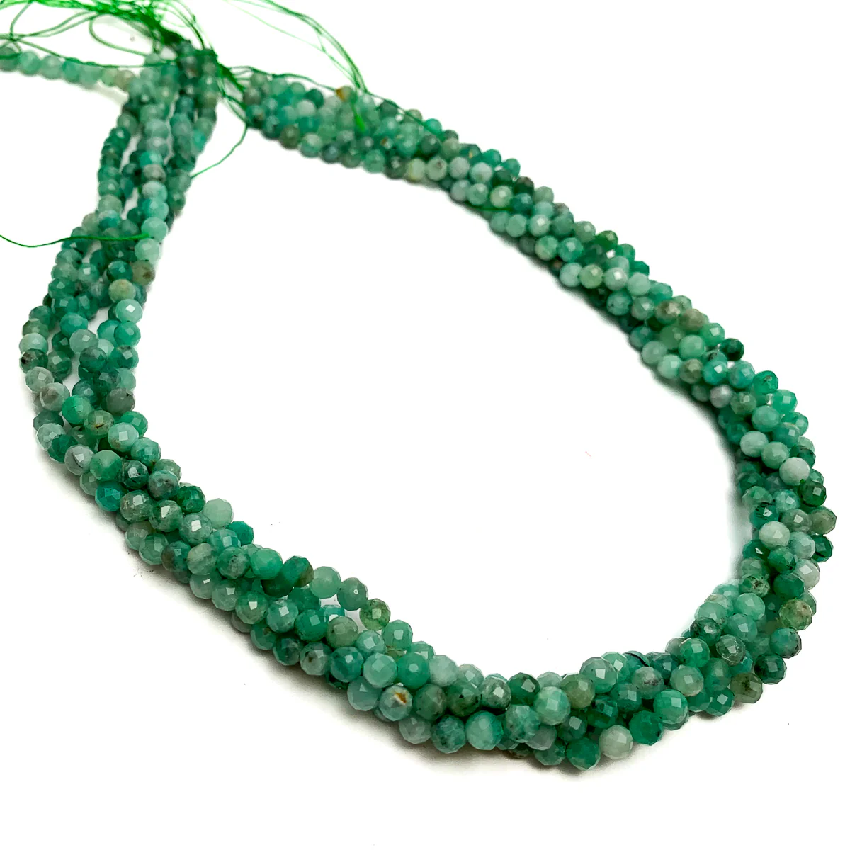 Emerald Columbia 4mm Faceted Rounds - Image 4
