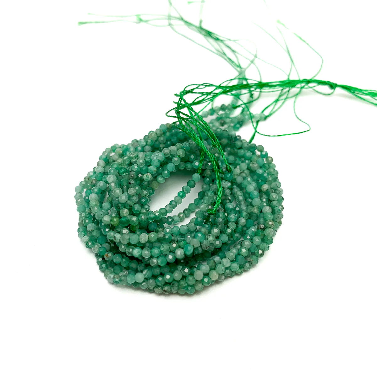 Emerald Columbia 2mm Faceted Rounds - Image 3