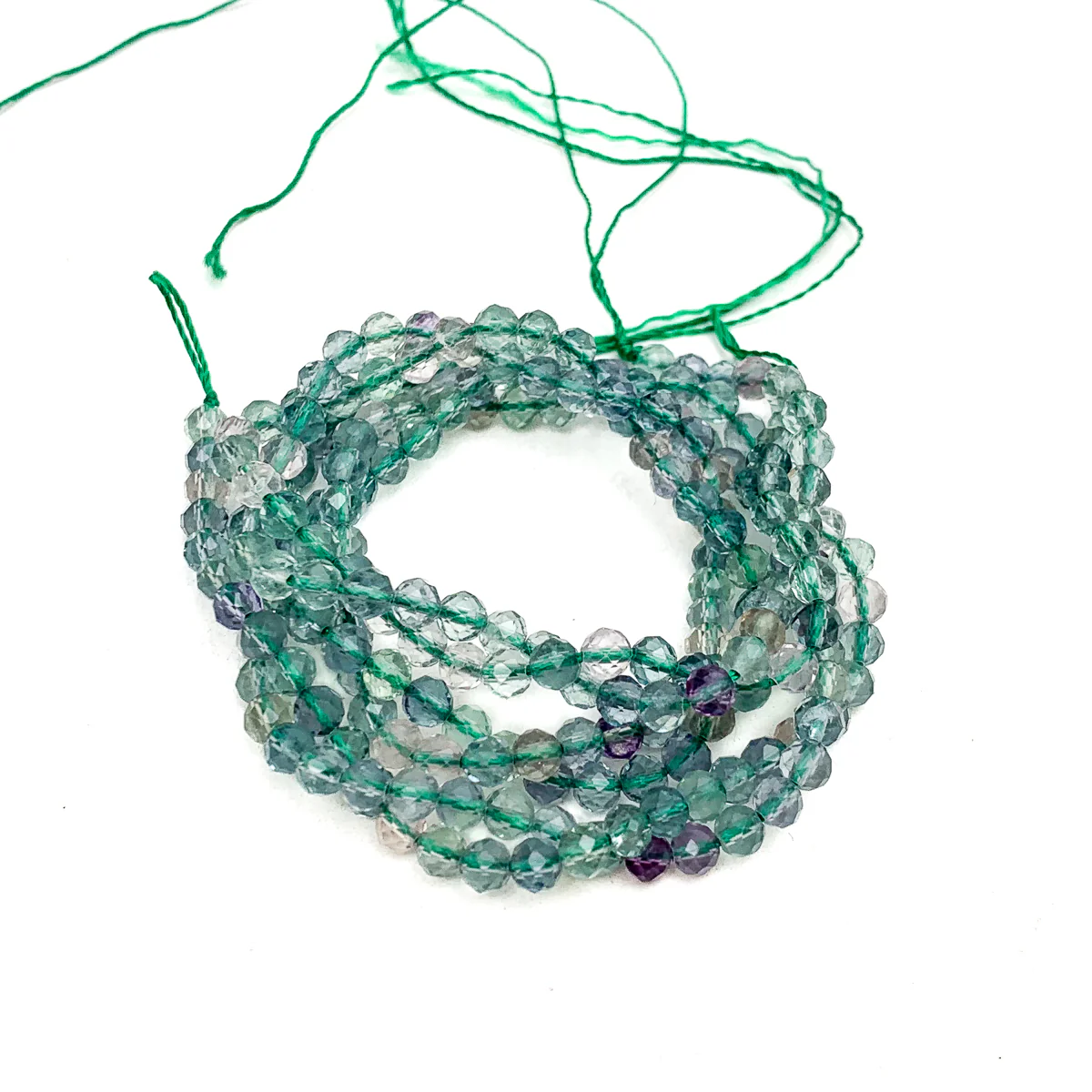 Fluorite Faceted 4mm Round Bead Strand - Image 3
