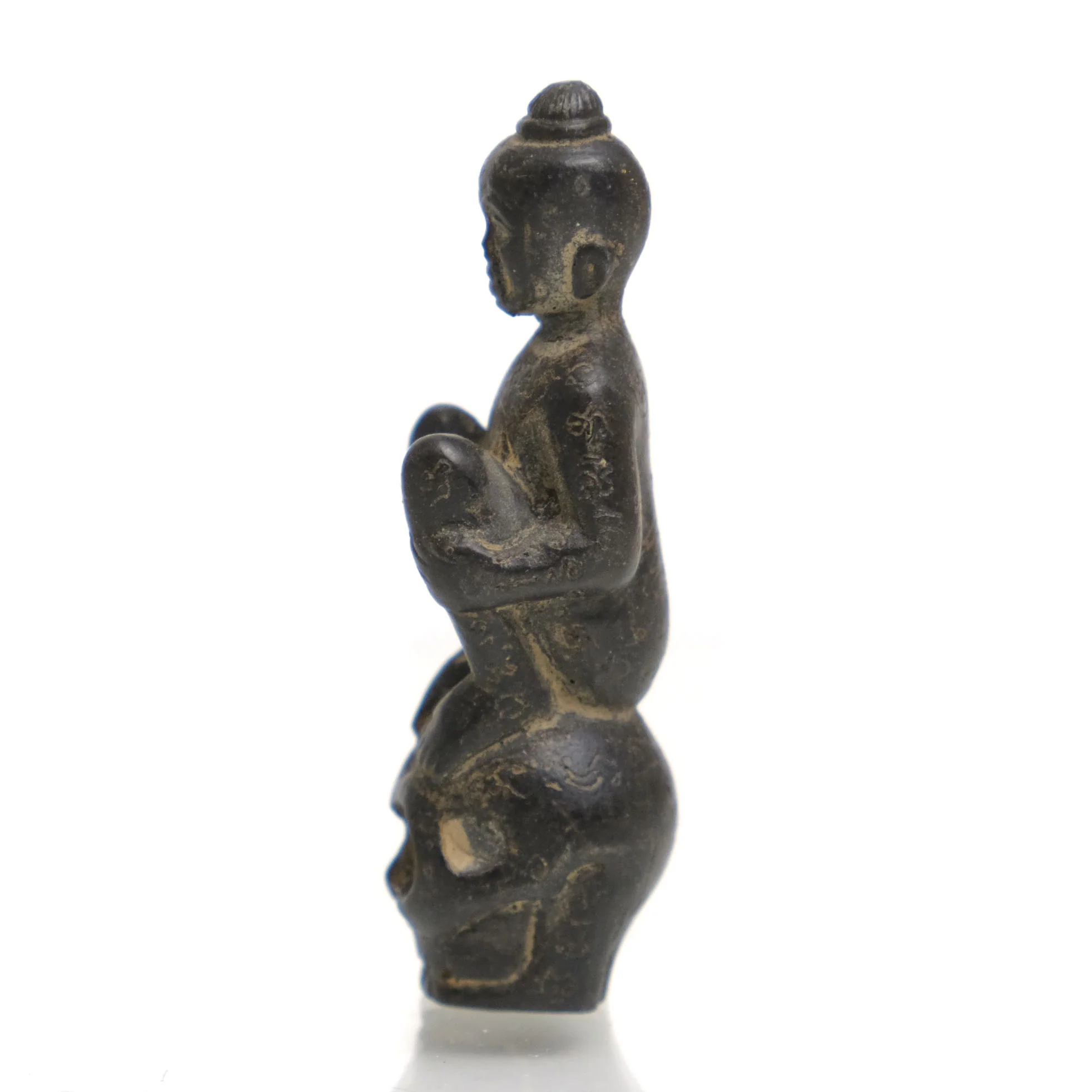 Kuman Thong Resting on a Skull Amulet - Image 2