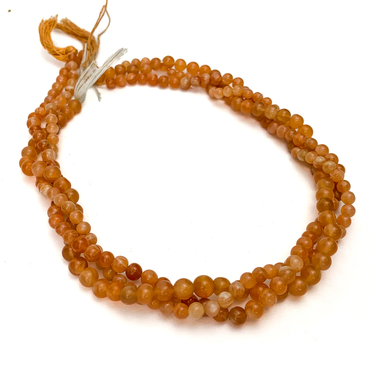 Peach Moonstone 4-6mm Smooth Rounds - Image 4
