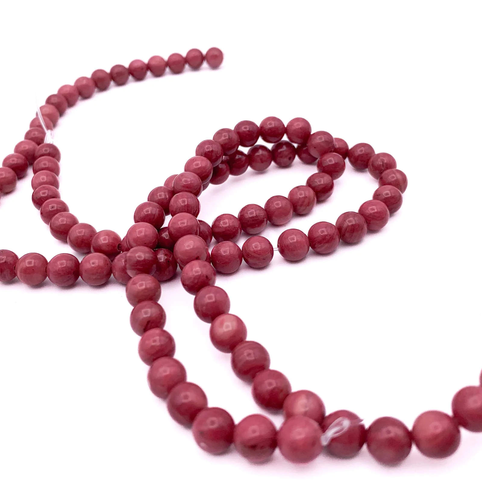 Rhodonite 6.4mm AAA Smooth Rounds Bead Strand - Image 3
