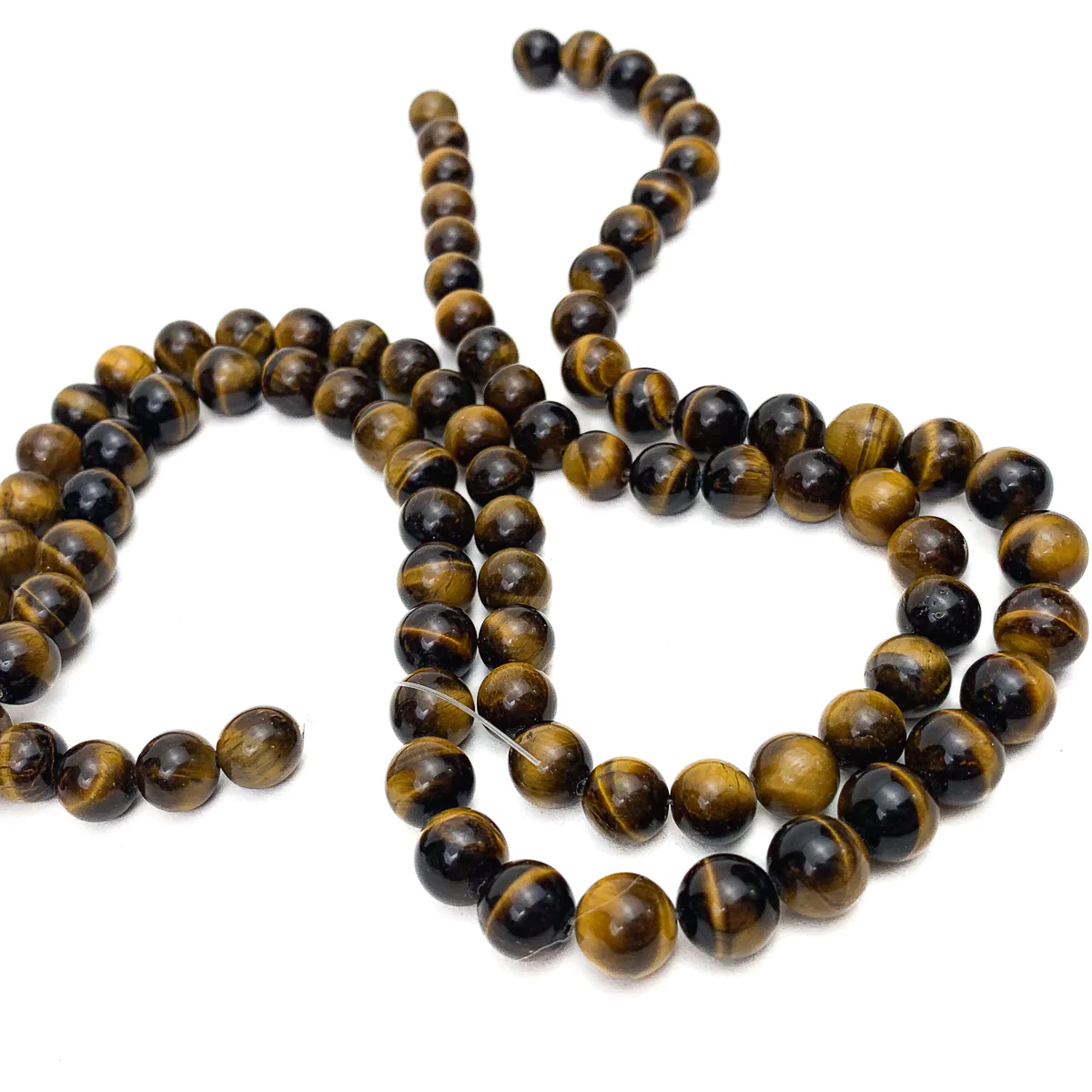 Tiger's Eye 9mm Smooth Rounds Bead Strand - Image 6