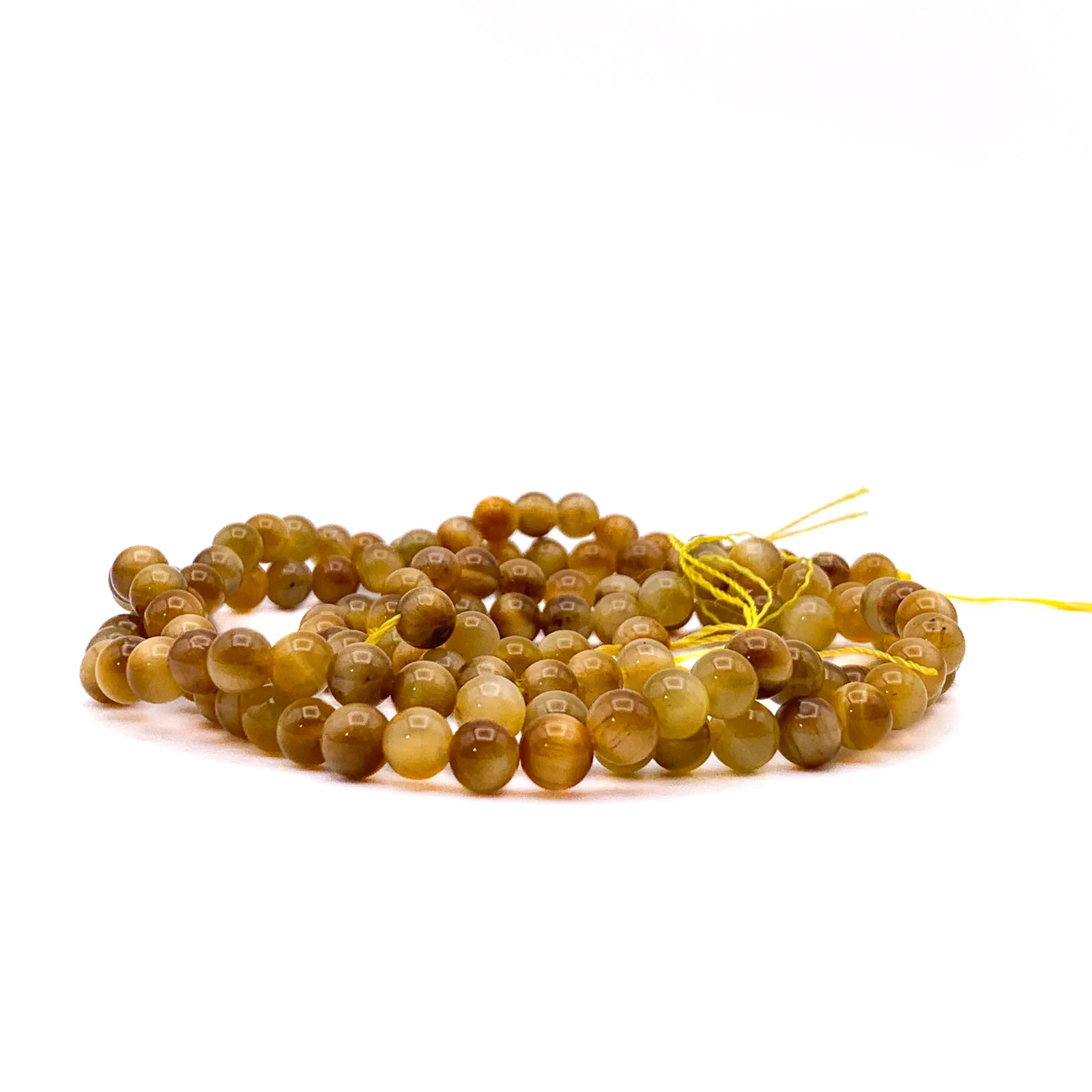 Tiger’s Eye Golden AAA 6.5mm Smooth Rounds Bead Strand - Image 10
