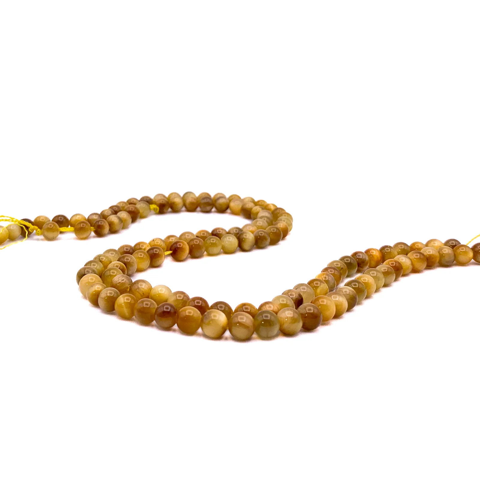 Tiger’s Eye Golden AAA 6.5mm Smooth Rounds Bead Strand - Image 4