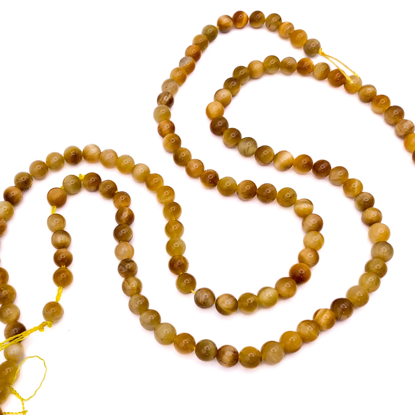 Tiger’s Eye Golden AAA 6.5mm Smooth Rounds Bead Strand - Image 5