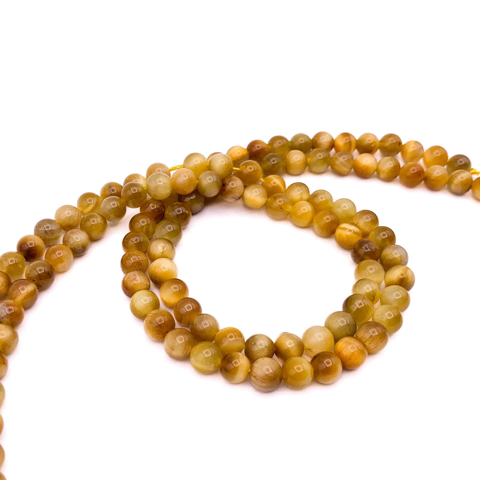 Tiger’s Eye Golden AAA 6.5mm Smooth Rounds Bead Strand - Image 6