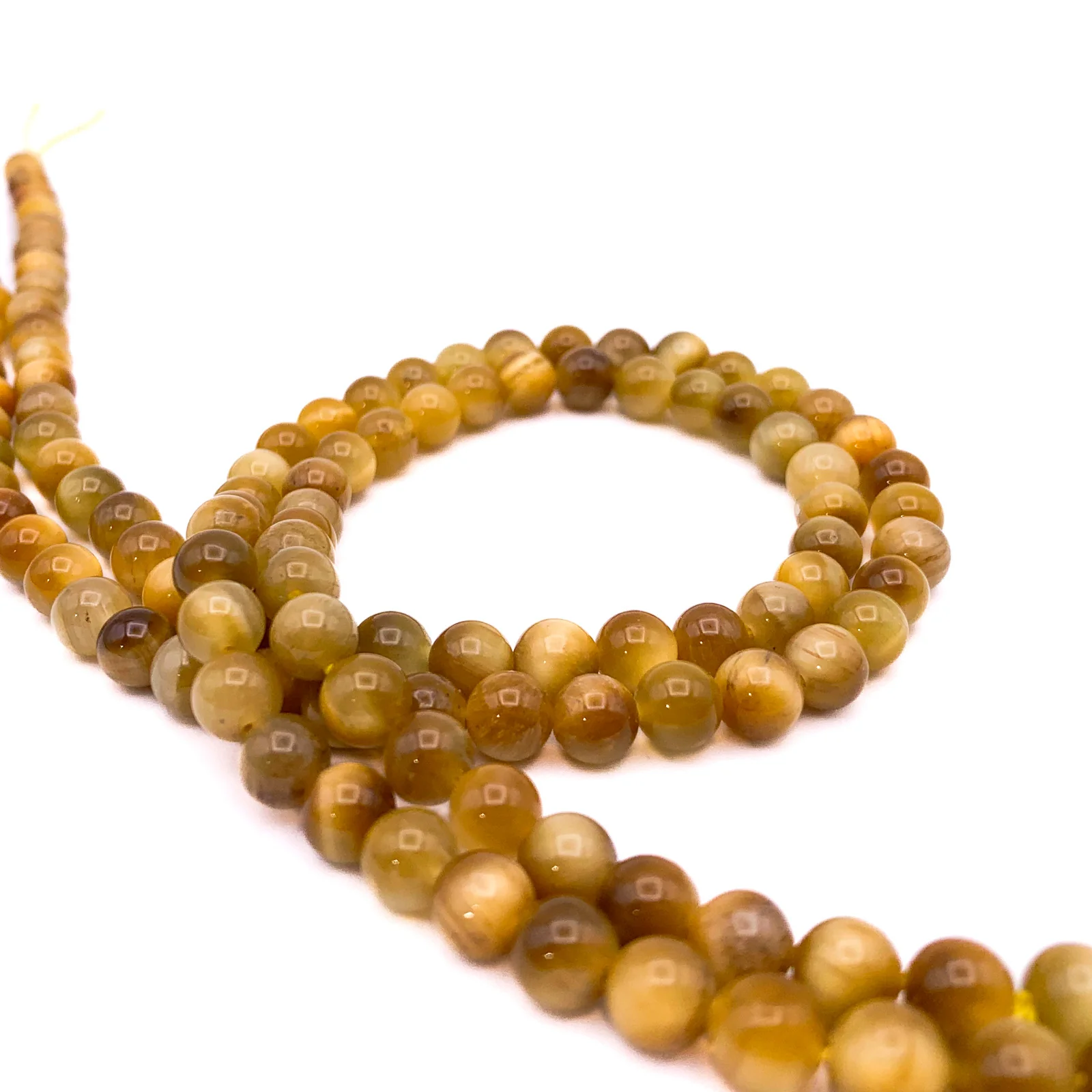 Tiger’s Eye Golden AAA 6.5mm Smooth Rounds Bead Strand - Image 7
